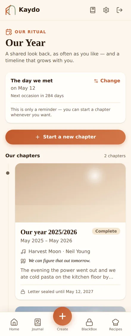 The "Our Year" timeline in Kaydo on a phone, showing a completed chapter and a sealed letter